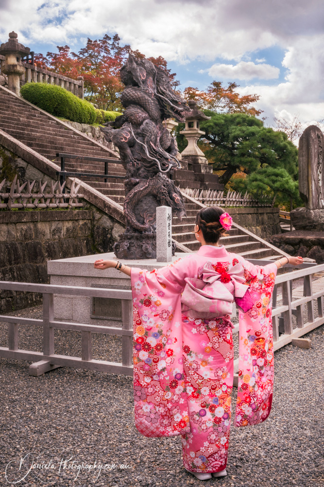 Kyoto Young lady in a beautiful traditional Japanese costume at Kiyomizu dera Buddhist Temple